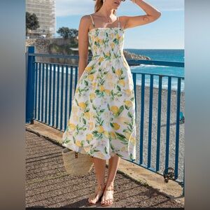 Pretty lemon sun dress from cup she. Never worn, NWT. Size large.